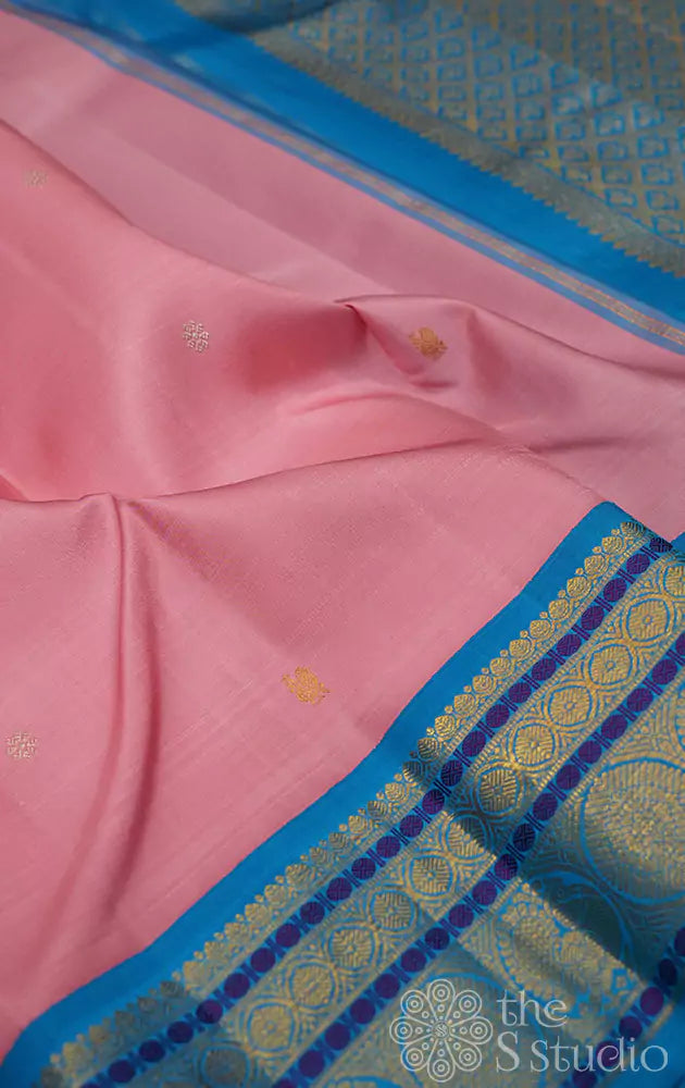 Light pink kanchi silk saree with korvai anandha blue border