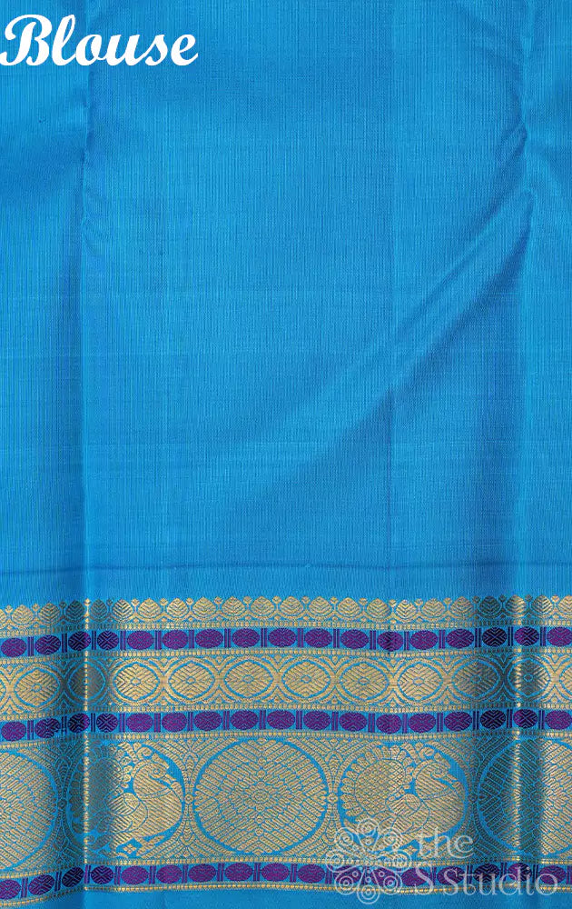 Light pink kanchi silk saree with korvai anandha blue border