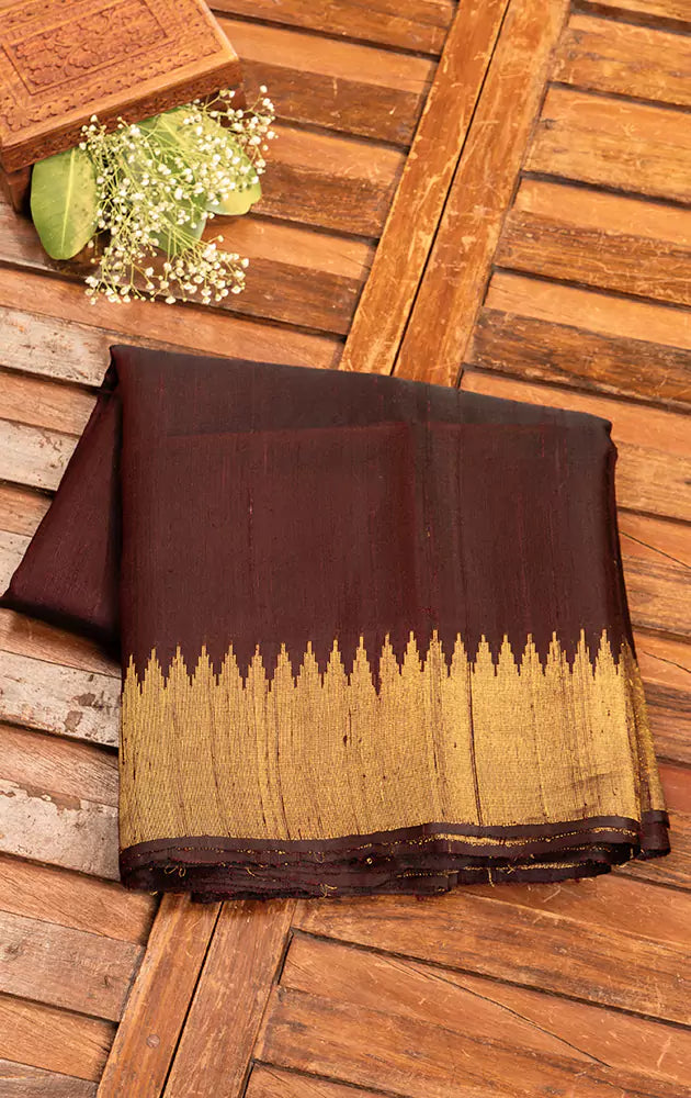 Dark brown handloom raw silk saree with temple border