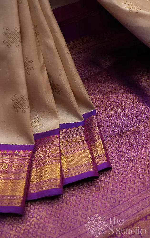 Off white kolam buttas Kanchipuram silk saree with purple border