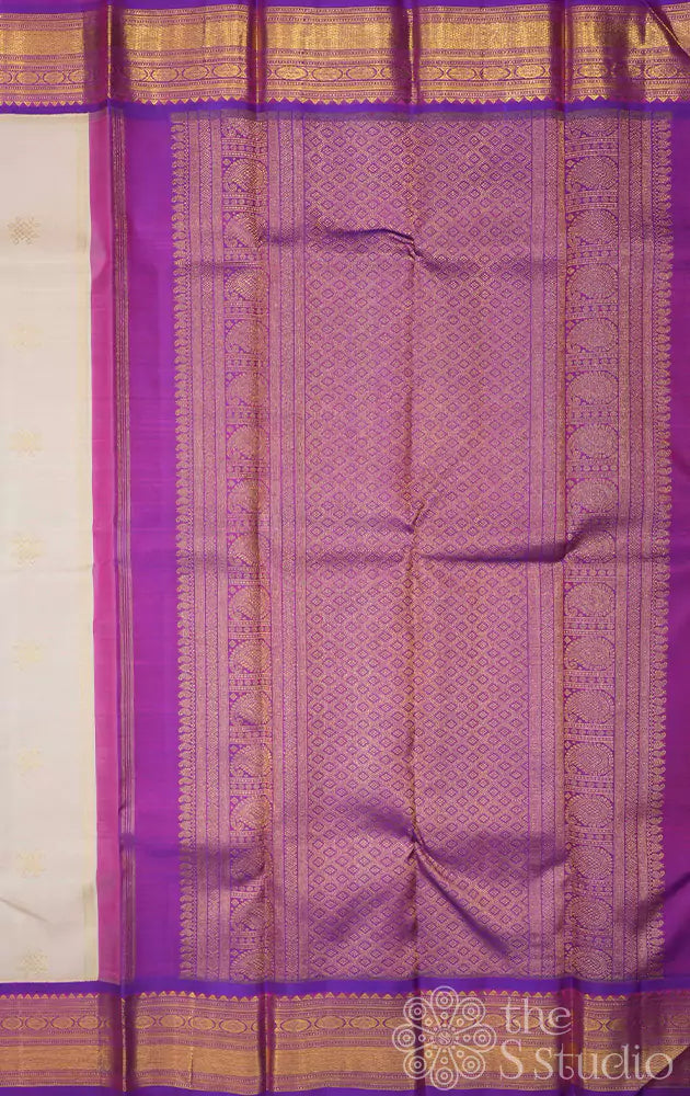 Off white kolam buttas Kanchipuram silk saree with purple border