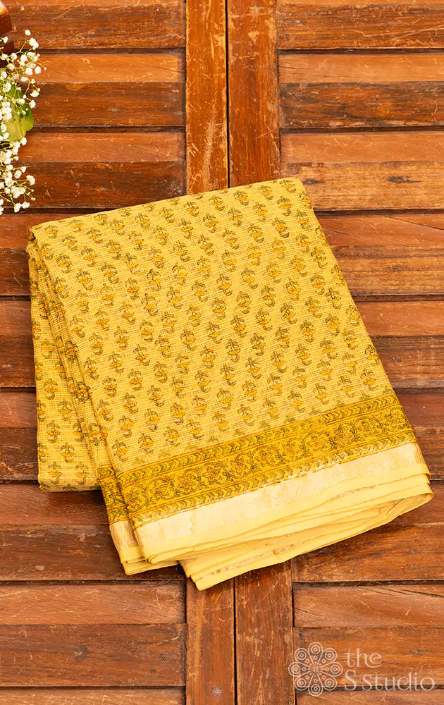 Mustard kota cotton saree with floral block print and zari border