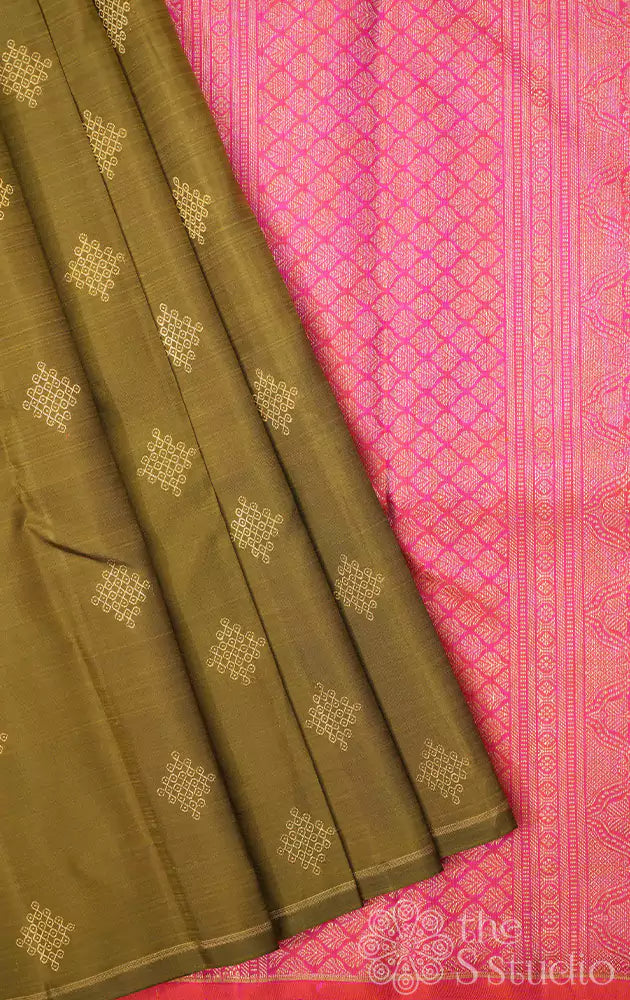 Methi green kanchi silk saree with traditional kolam buttas woven in pure zari