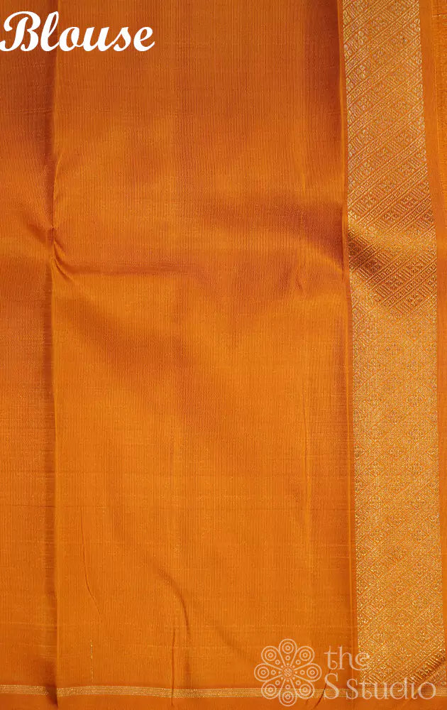 Slate grey kanchi silk saree with traditional kolam buttas woven in pure zari