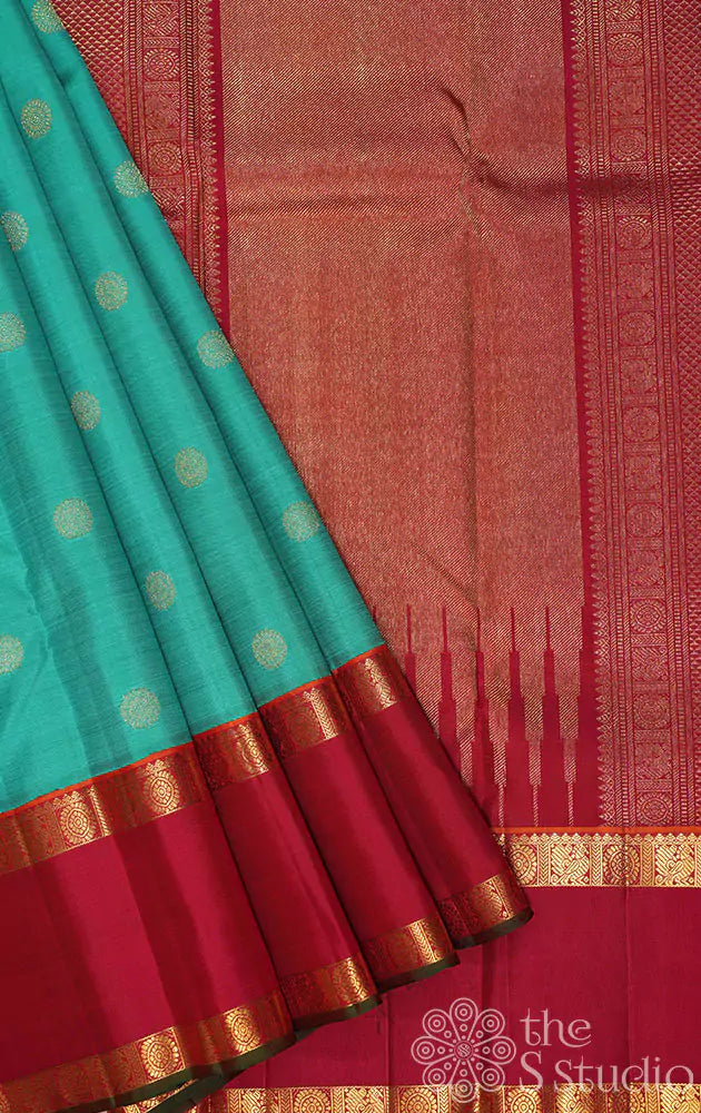 Sea green kanjivaram saree with red border