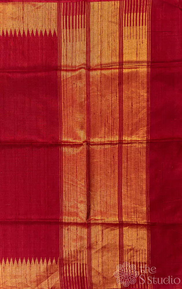Maroon handwoven raw silk saree featuring a temple zari border.