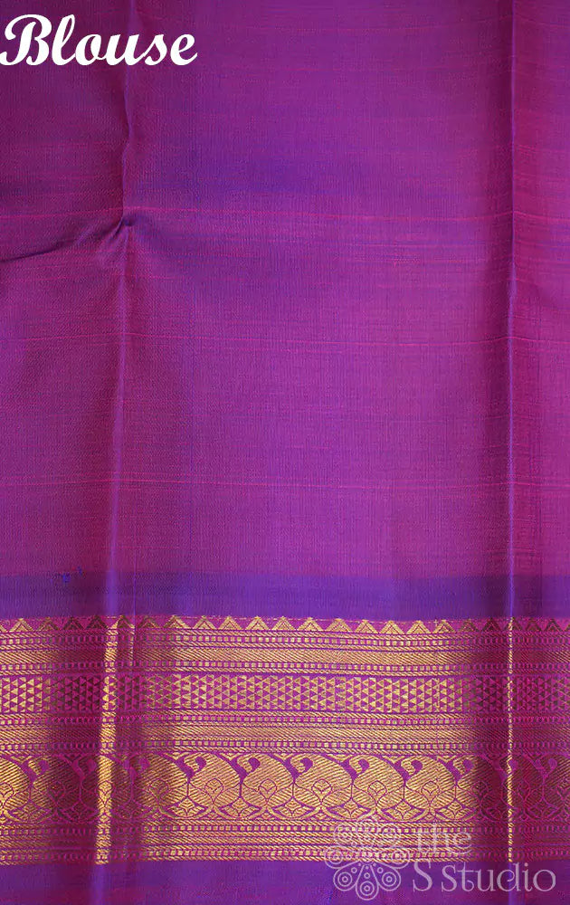 Off white kanchipuram silk saree with purple border