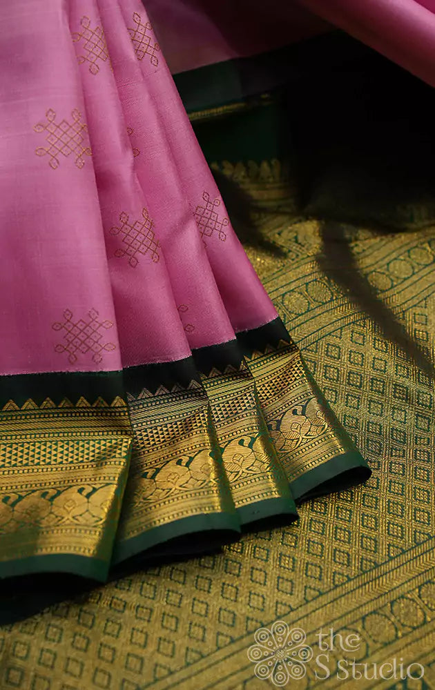 Pink Kanchipuram silk saree with korvai green border