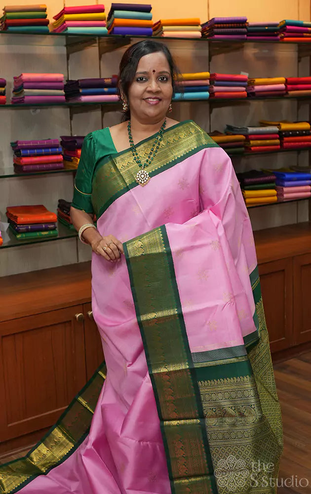 Pink Kanchipuram silk saree with korvai green border