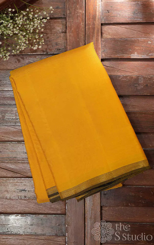 Yellow simple kanchi silk saree with green pallu