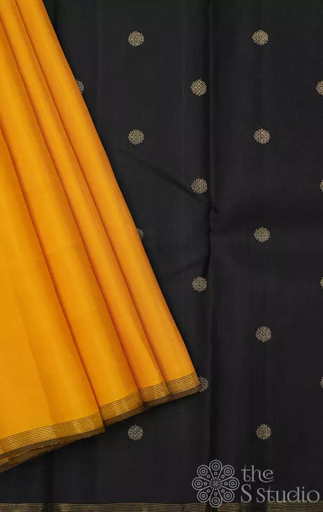 Yellow simple kanchi silk saree with black pallu