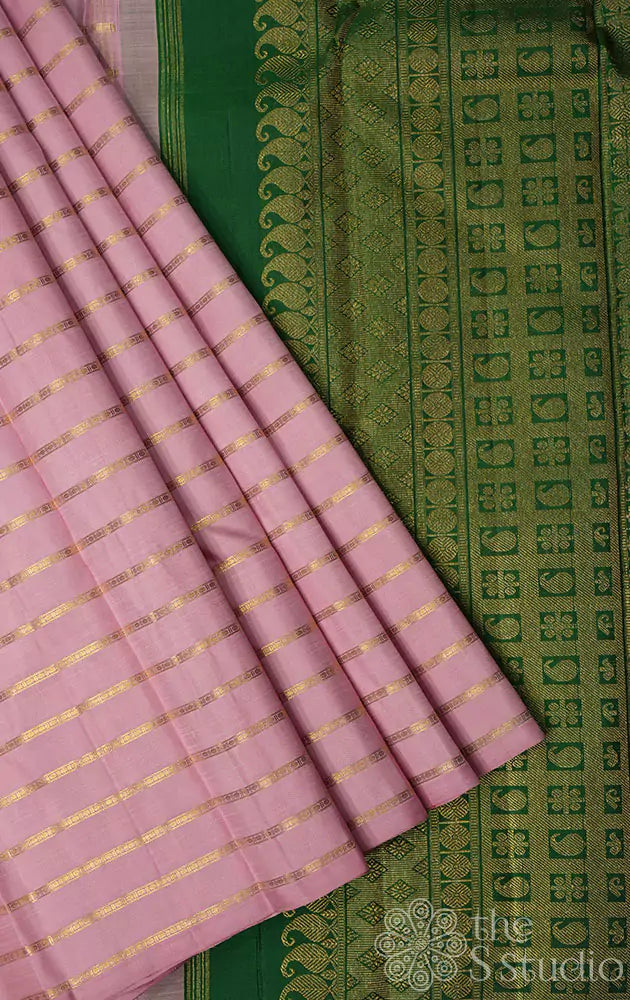 Onion pink kanchi silk saree with zari parallel lines on the body and a contrast green pallu