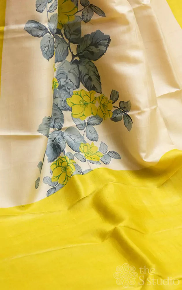 Off-white tussar silk saree with lemon yellow border