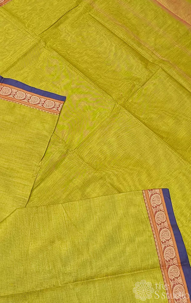 Mustard yellow kanchi cotton saree with a small thread border of mango motifs