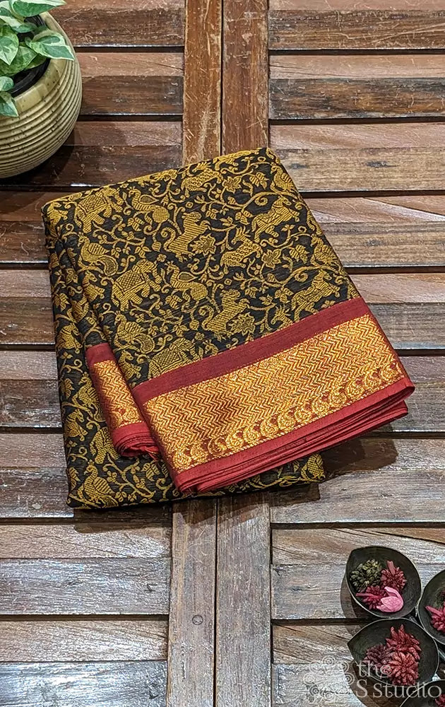 Black kanchi cotton saree featuring vanasingaram motifs