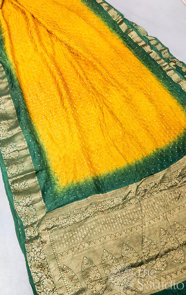 Mustard bandhini saree with green banarasi border