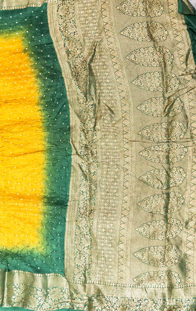 Mustard bandhini saree with green banarasi border