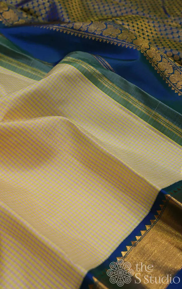 Off white kasa kasa kattam kanchipuram silk saree with korvai blue border