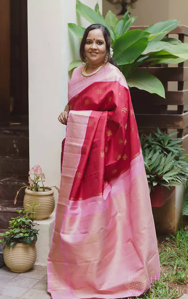 Red kanchipuram silk saree with pink border