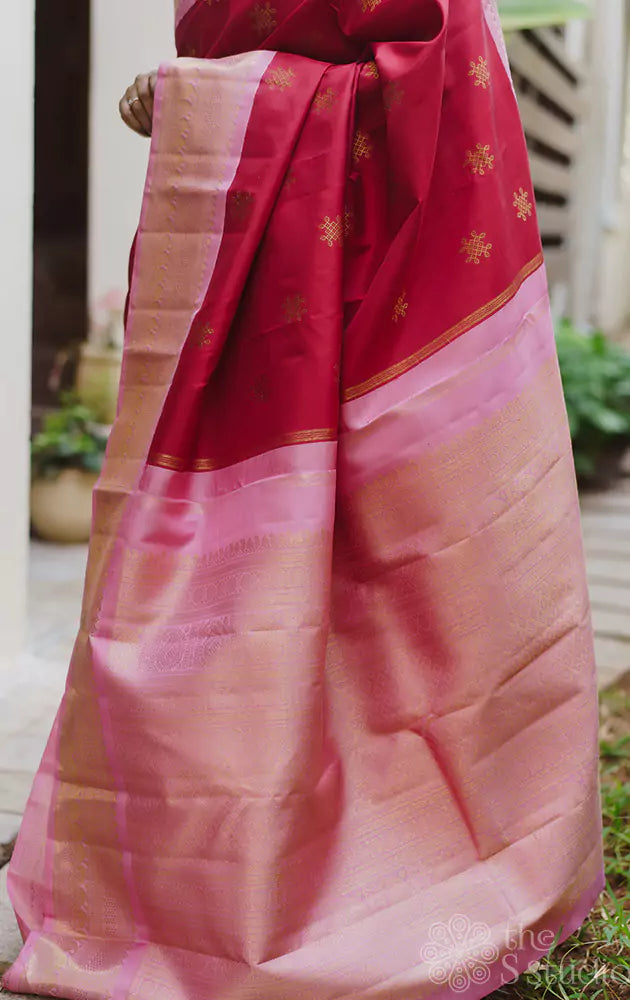 Red Kanchipuram silk saree with pink border