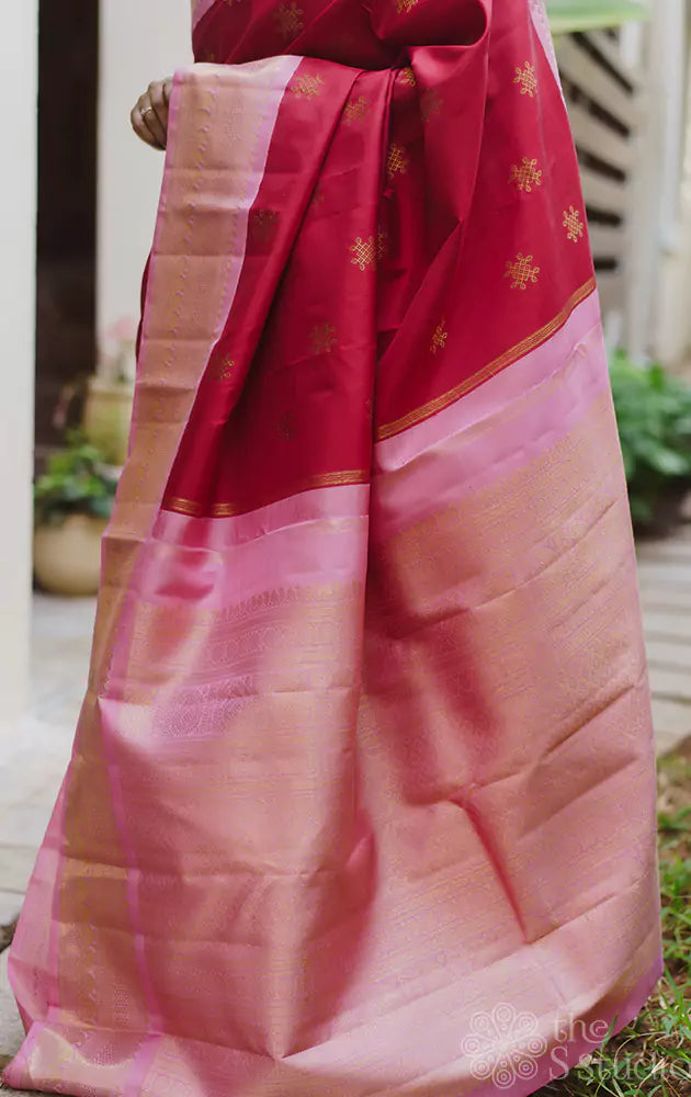 Red kanchipuram silk saree with pink border