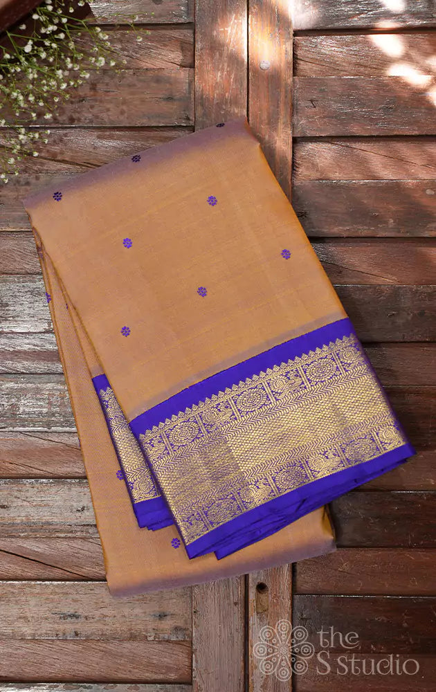 Biscuit brown kanchi silk saree with thread buttas and korvai border