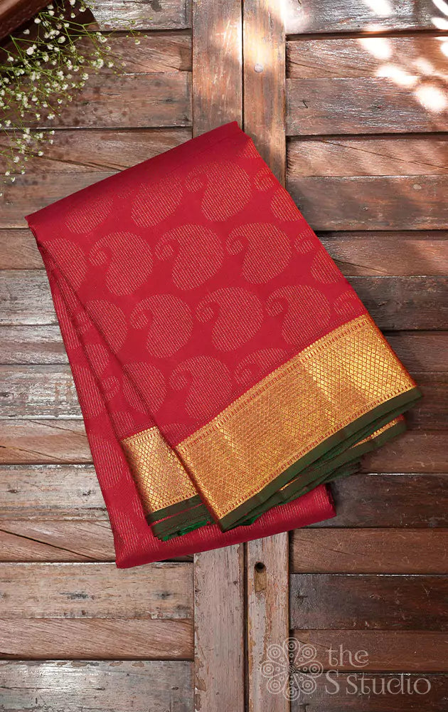 Red bridal kanchi silk saree with paisley motifs