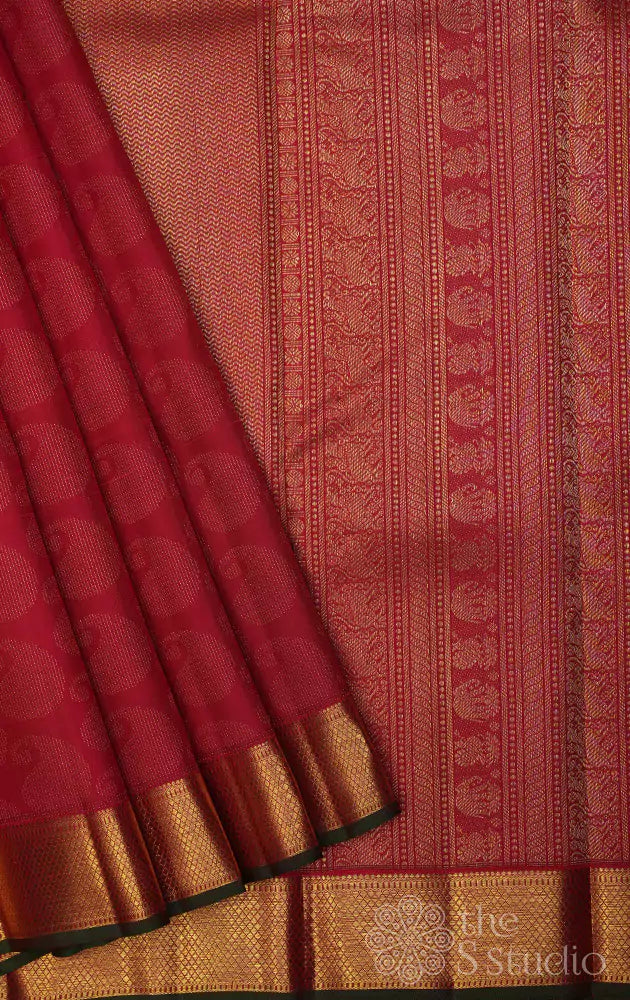 Red bridal kanchi silk saree with paisley motifs