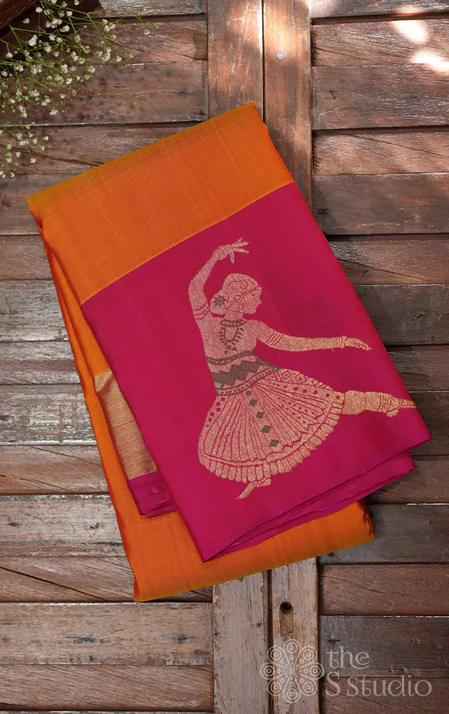 Mustard kanchi silk saree with rani pink dancing lady border