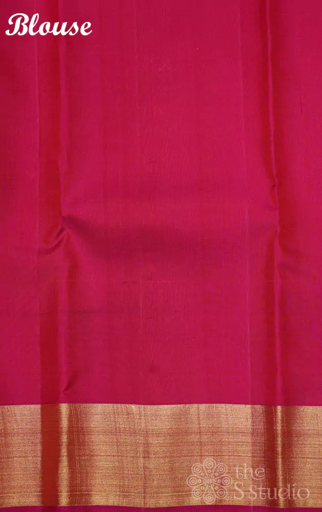 Mustard kanchi silk saree with rani pink dancing lady border