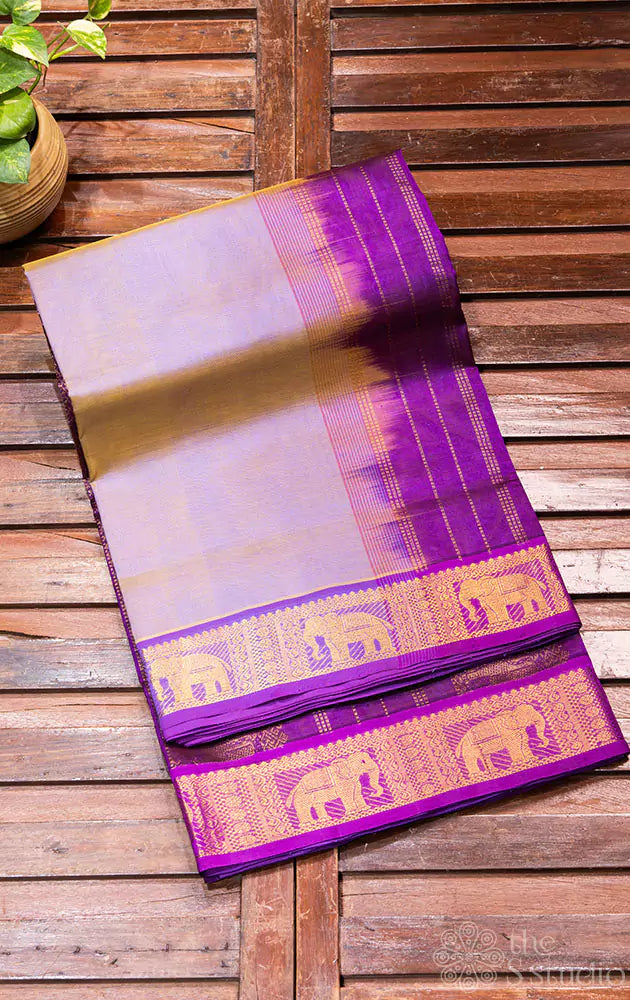 Lavender plain silk cotton ten yards saree with purple border