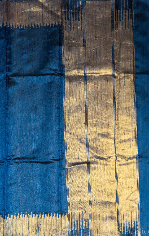 Peacock blue handwoven raw silk saree with temple  border