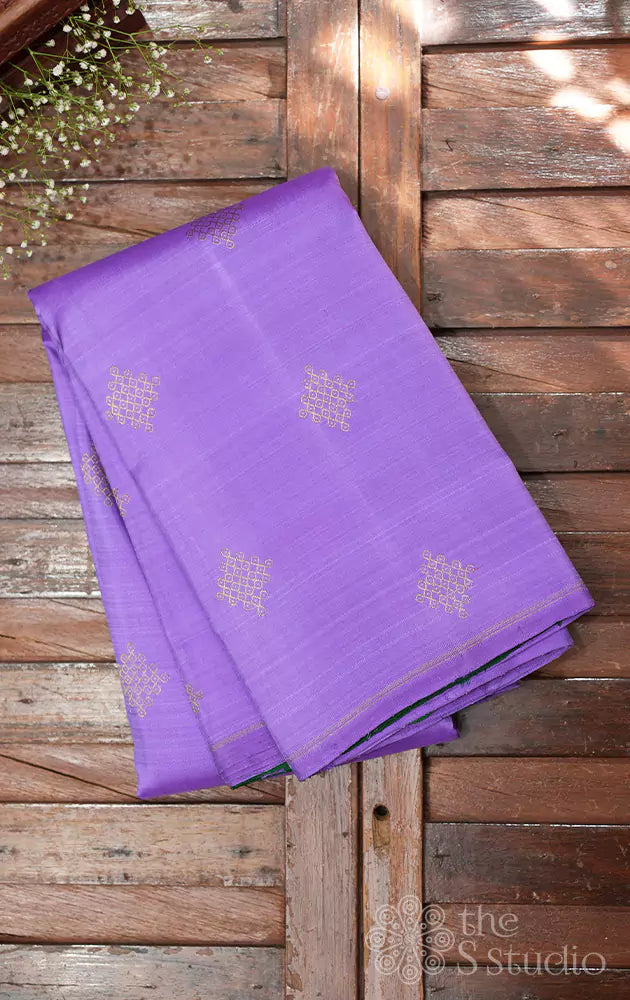 Lavendar kanjivaram silk saree with kolam buttas and green pallu