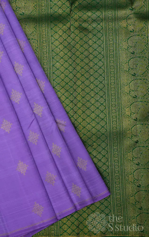 Lavendar kanjivaram silk saree with kolam buttas and green pallu