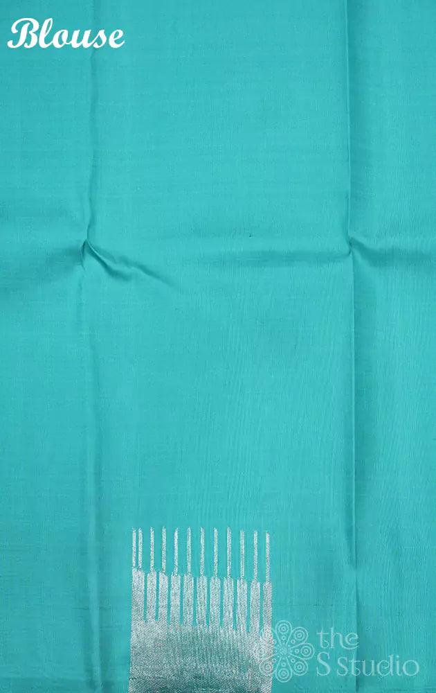 Sea green kanchi silk saree with silver zari seepu reku design border