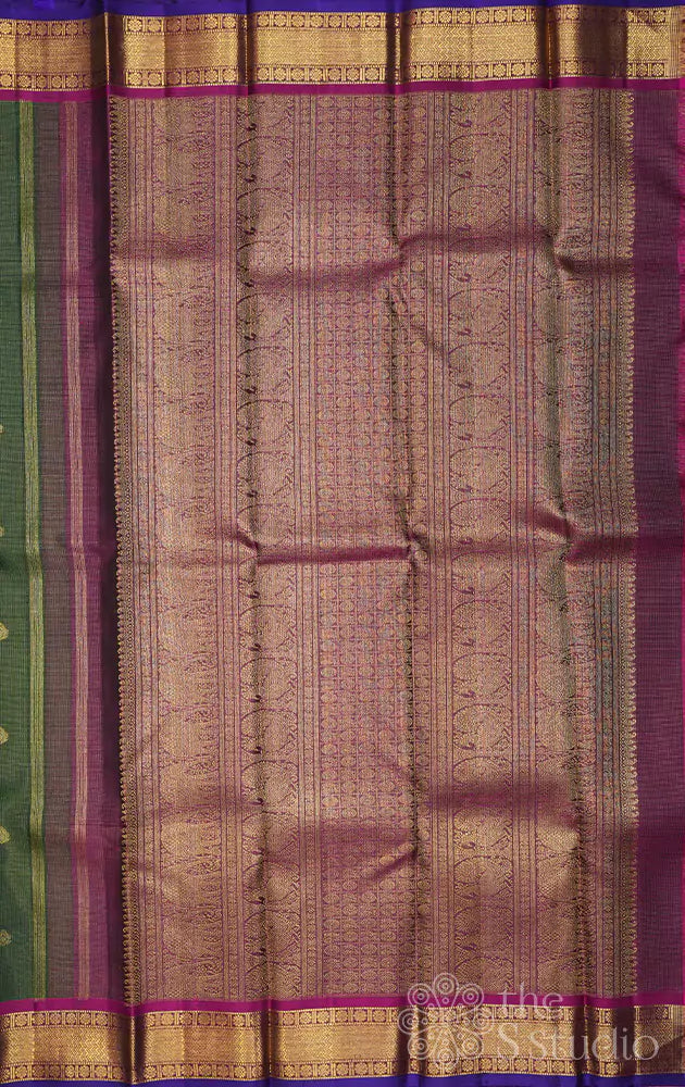 Emerald green vaira oosi kanchi silk saree with rani pink border