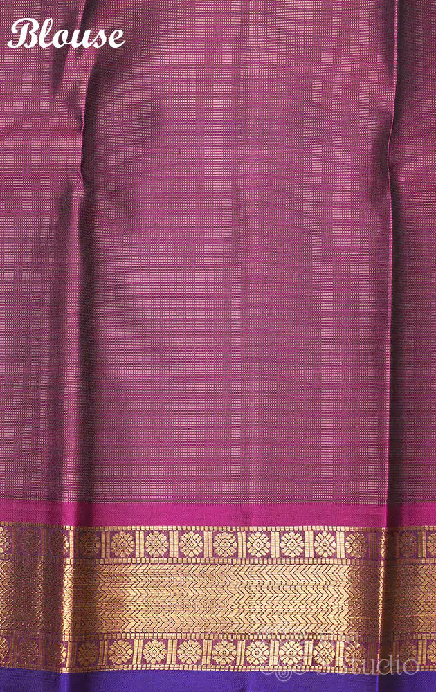 Emerald green vaira oosi kanchi silk saree with rani pink border