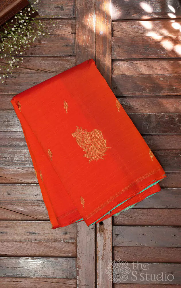 Orange kanchipuram silk saree with pichwai cow zari motifs