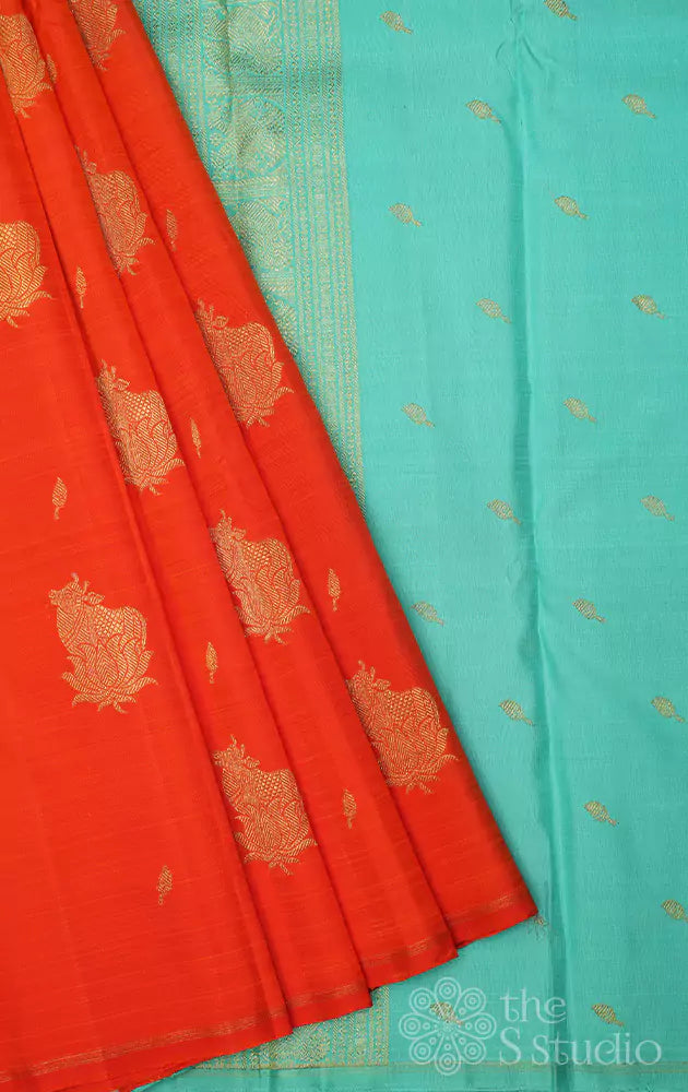 Orange kanchipuram silk saree with pichwai cow zari motifs