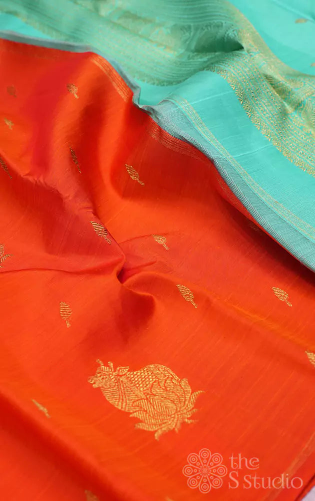 Orange kanchipuram silk saree with pichwai cow zari motifs