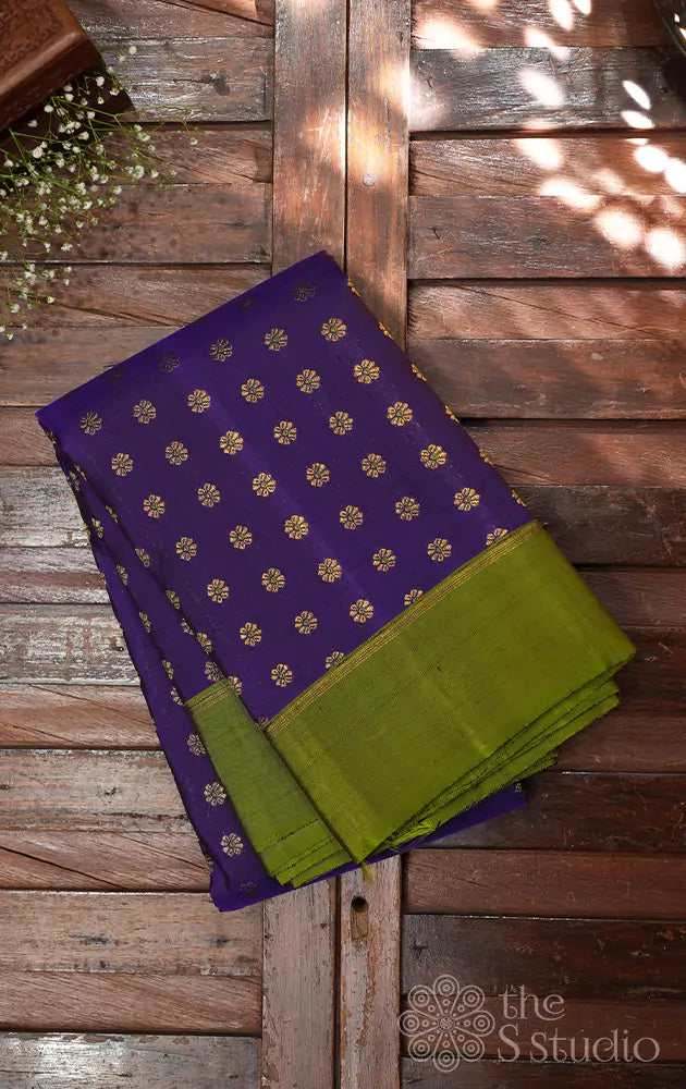 Violet kanjivaram saree with chutney green border and pallu