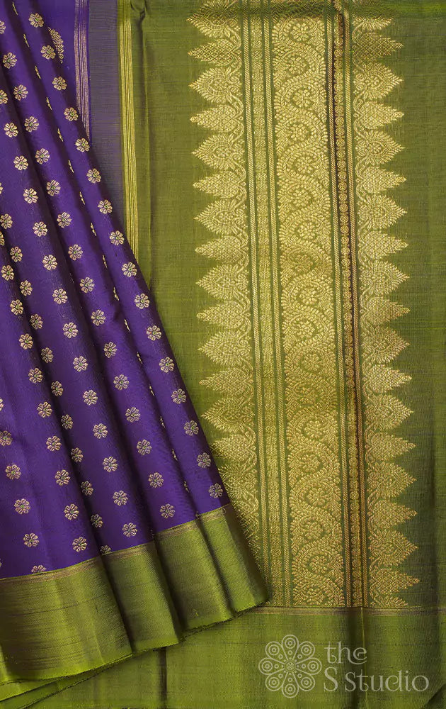 Violet kanjivaram saree with chutney green border and pallu