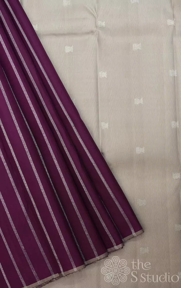 Deep purple kanchipuram silk saree with vertical silver zari lines and contrast pallu