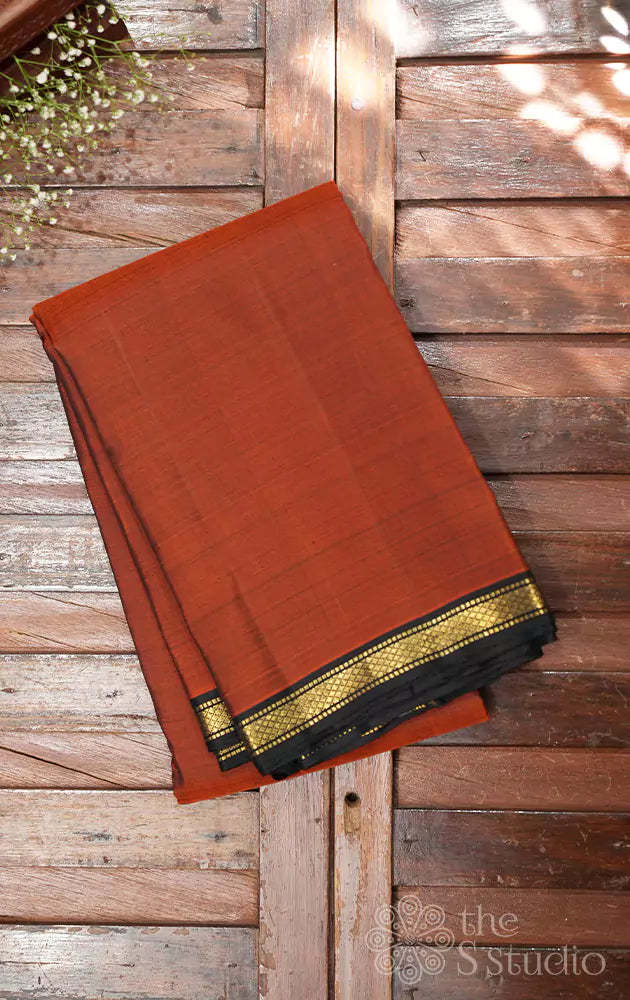 Rust kanjivaram saree with small black border