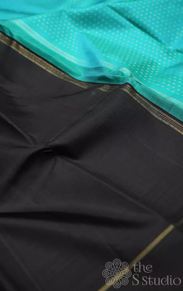 Black simple kanjivaram silk with aqua blue pallu