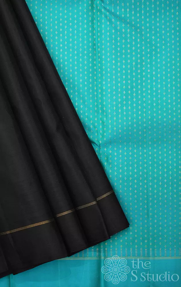 Black simple kanjivaram silk with aqua blue pallu