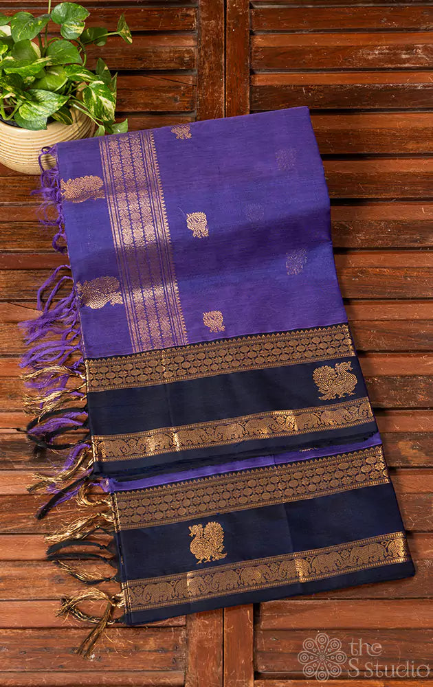 Dark lavender peacock motif silkcotton saree with navy blue rettaipet border