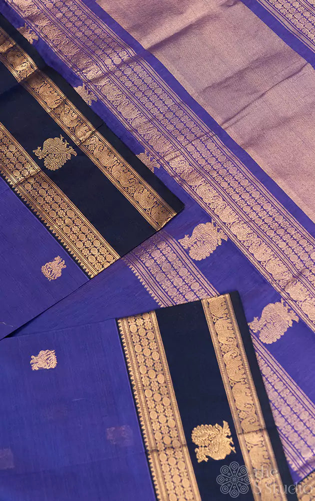 Dark lavender peacock motif silkcotton saree with navy blue rettaipet border