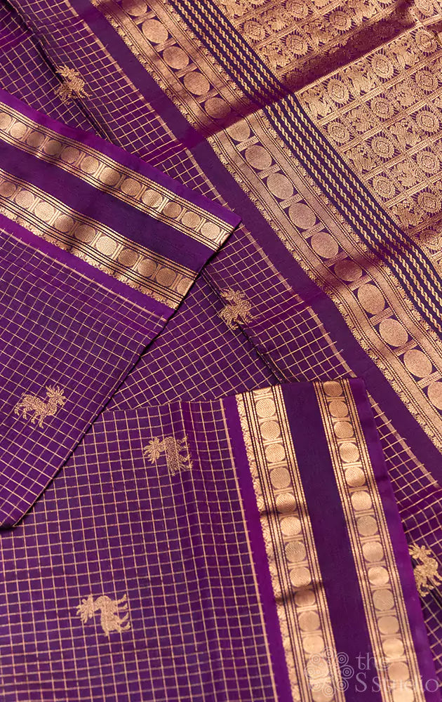 Purple checked silkcotton saree with deer butta