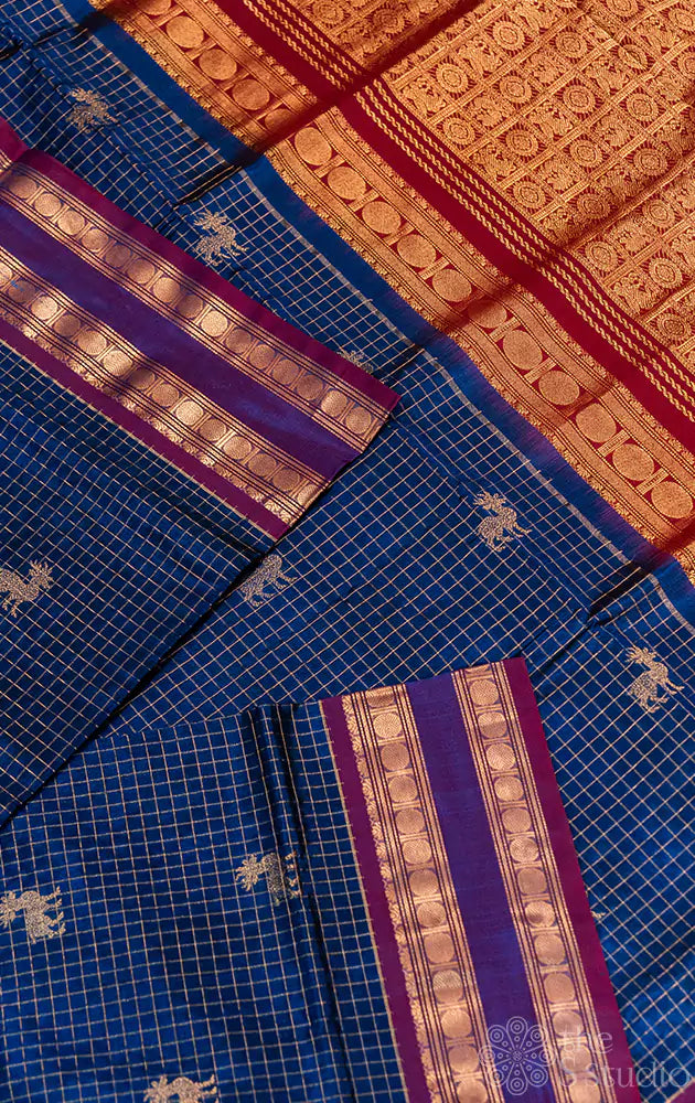 Blue checked silkcotton saree with deer butta